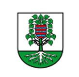 Wappen mit grünem Boden: darauf ein Baum mit grüner Krone und weißen Wurzeln, im Stamm ein rot-blau gestreifter Schild.